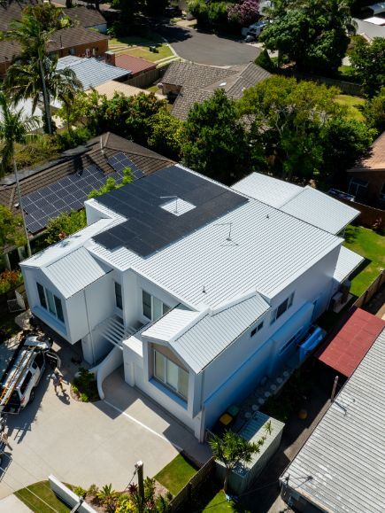 Glowing lightbulb with foliage, symbolizing renewable energy or a new idea — OzEnergi in Caloundra West, QLD