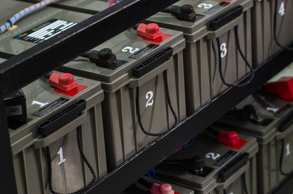 Nine Numbered Batteries With Red and Black Terminals — OzEnergi in Southport, QLD