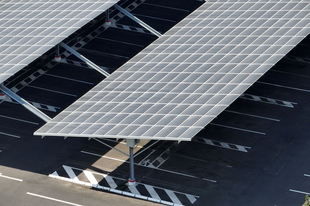 Solar Panels Covering Parking Spaces in a Lot — OzEnergi in Caloundra, QLD