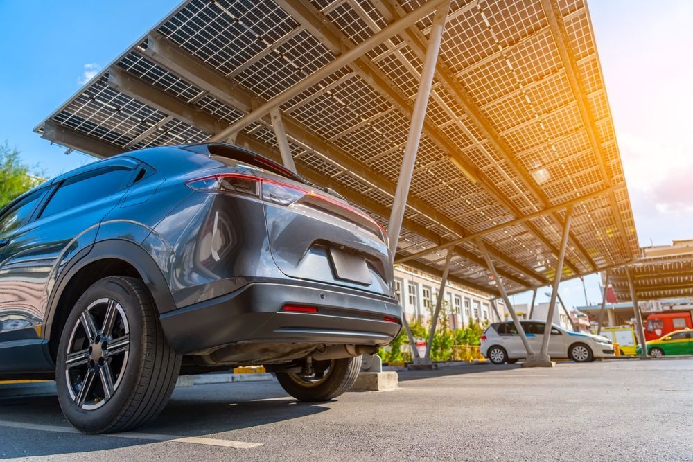Cars Parked Under a Solar Panel Carport — OzEnergi in Maroochydore, QLD
