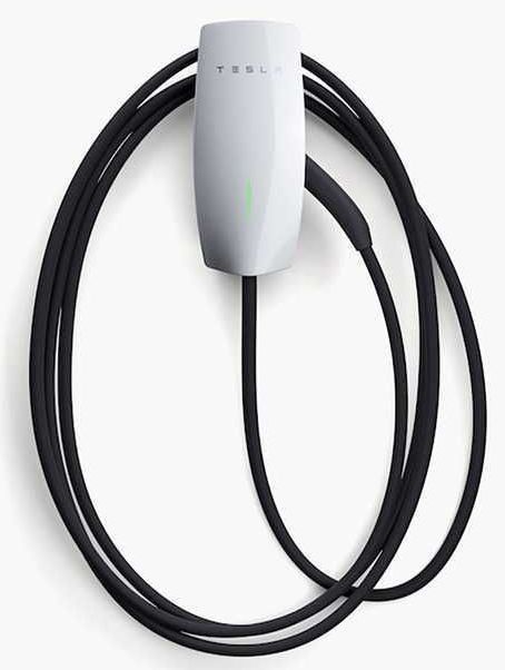 A black device with a green circle on it that says `` ev charge point ''.