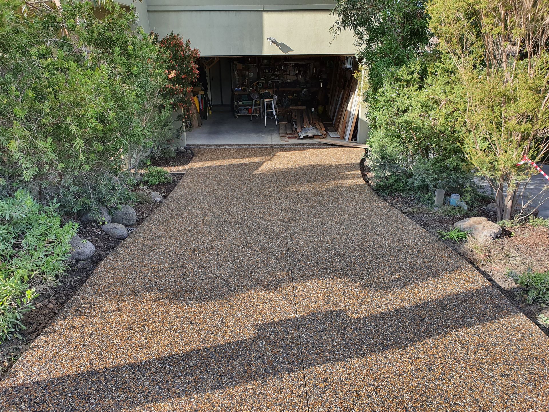 A Brown Concrete Driveway - Melbourne, VIC - Salcon Paving