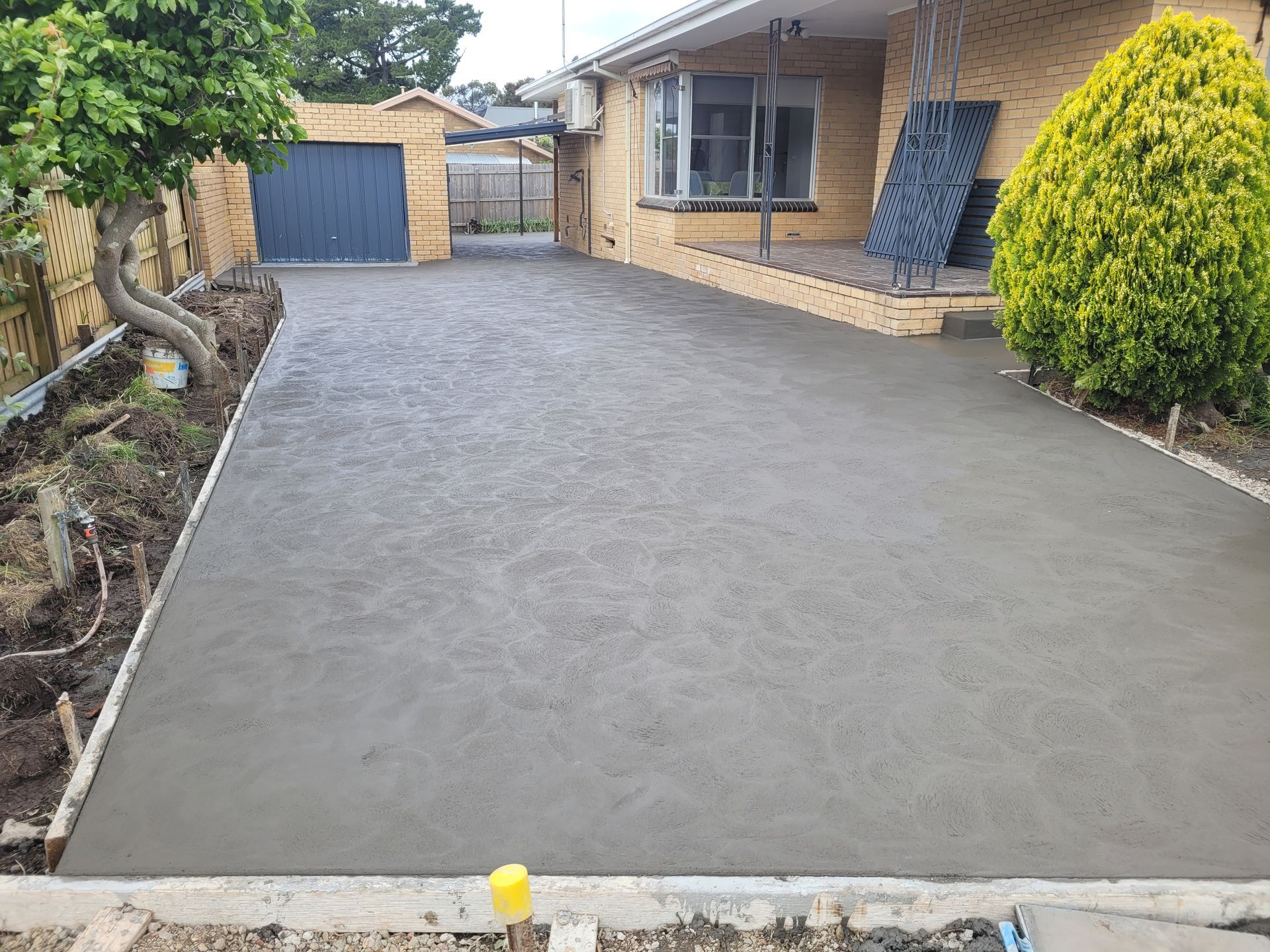 Wet Concrete Driveway - Melbourne, VIC - Salcon Paving