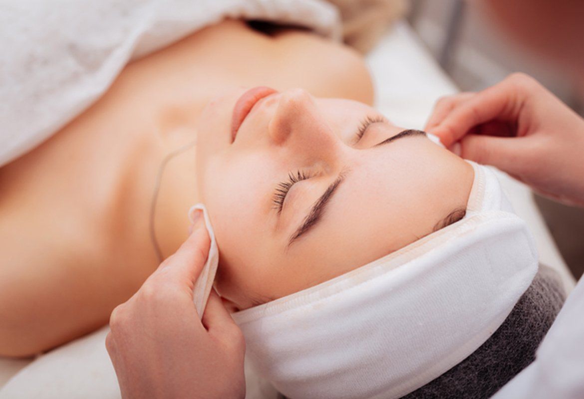 A Woman Getting A Facial Treatment — Troy, NY — Brunswick Esthetics