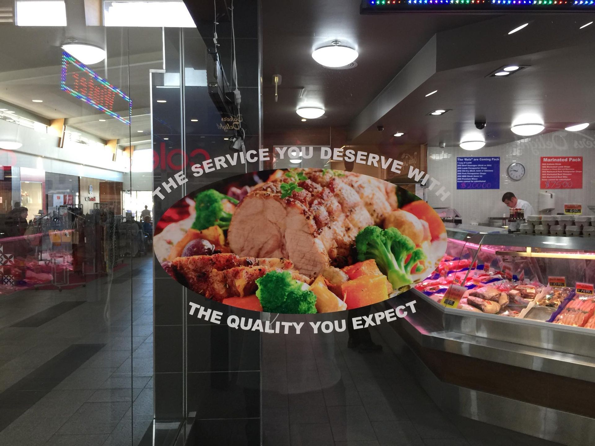 A restaurant with a sign that says the service you deserve with the quality you expect - Plastiglass Mid North Coast, NSW