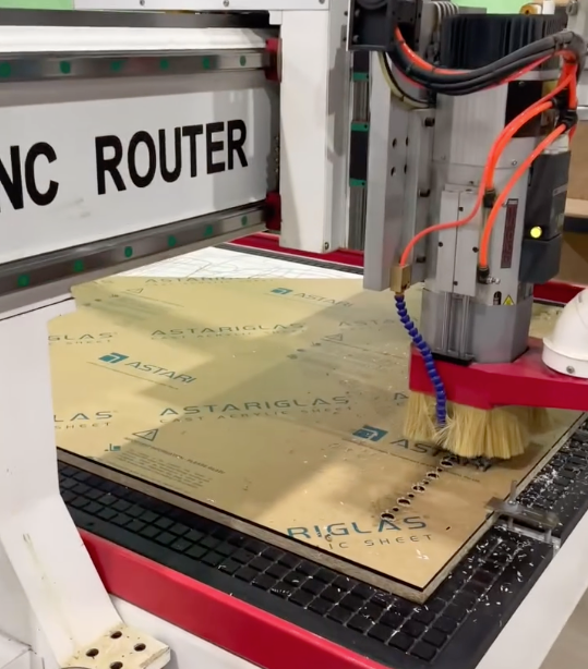 A cnc router is cutting a piece of acrylic - Plastiglass Mid North Coast, NSW