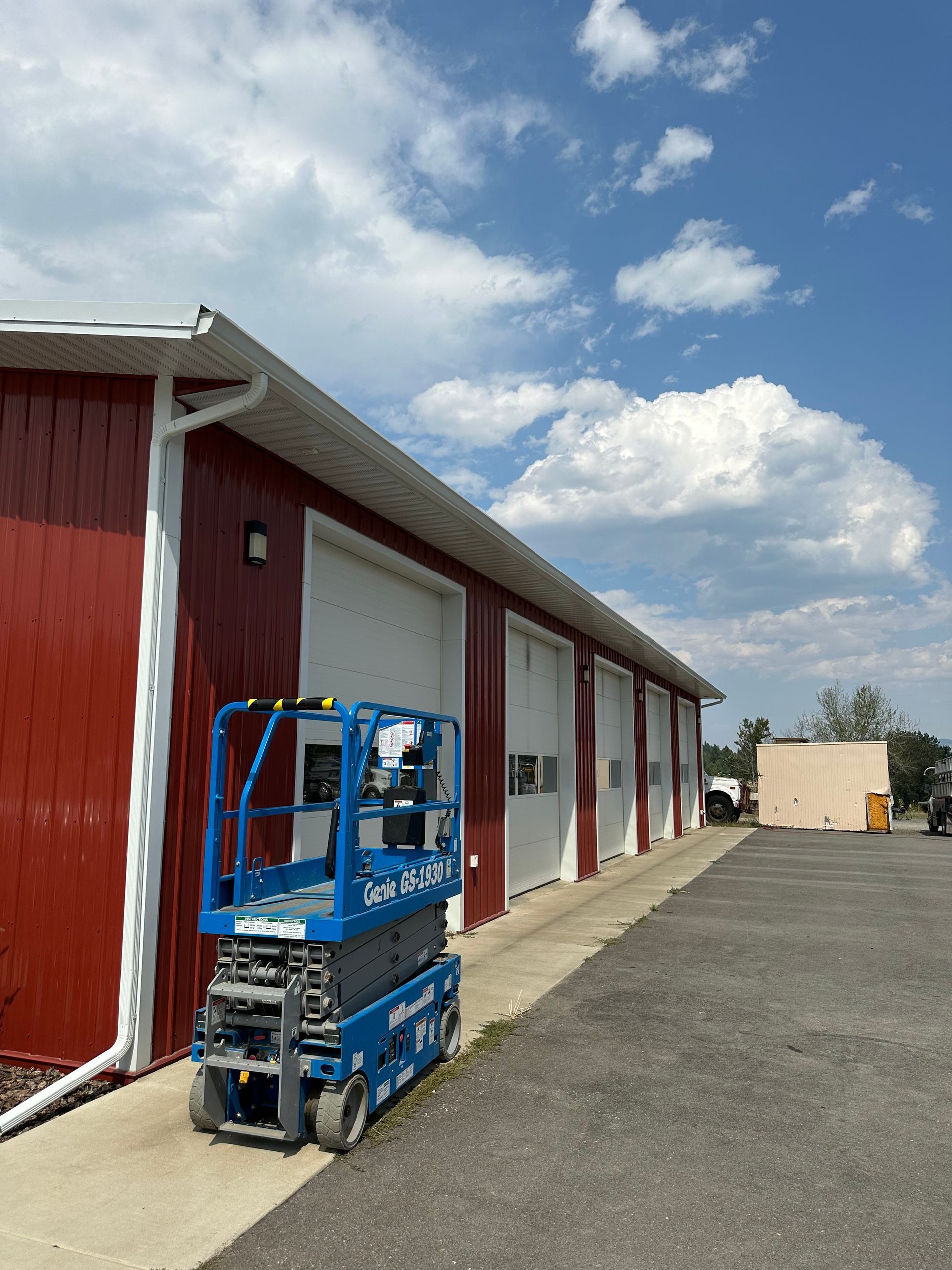 new gutters installeed by a gutter contractor on a commercial building, gutters on a garage in missoula montana