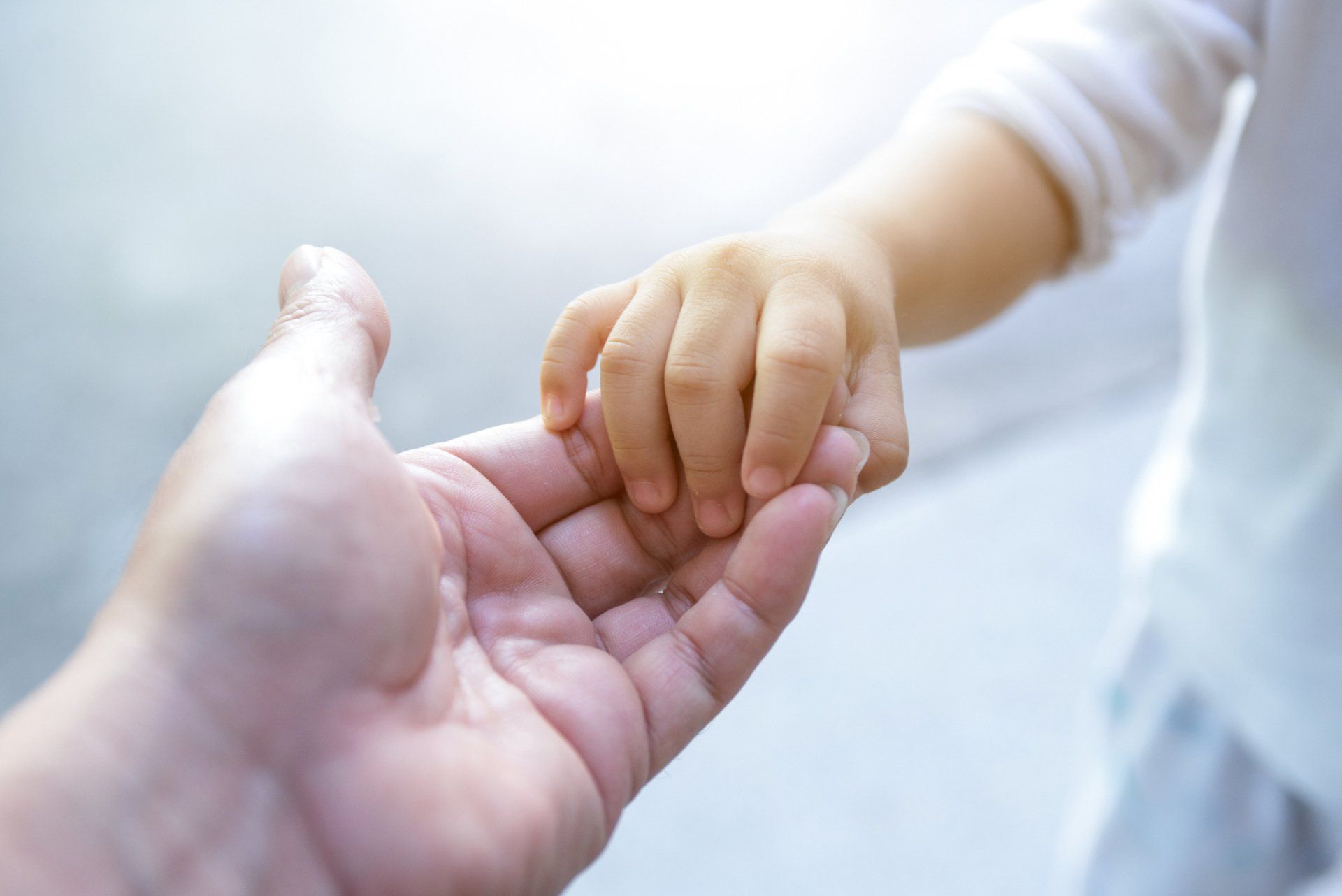 Holding Kid's Hand — Columbia, MD — SPM Law