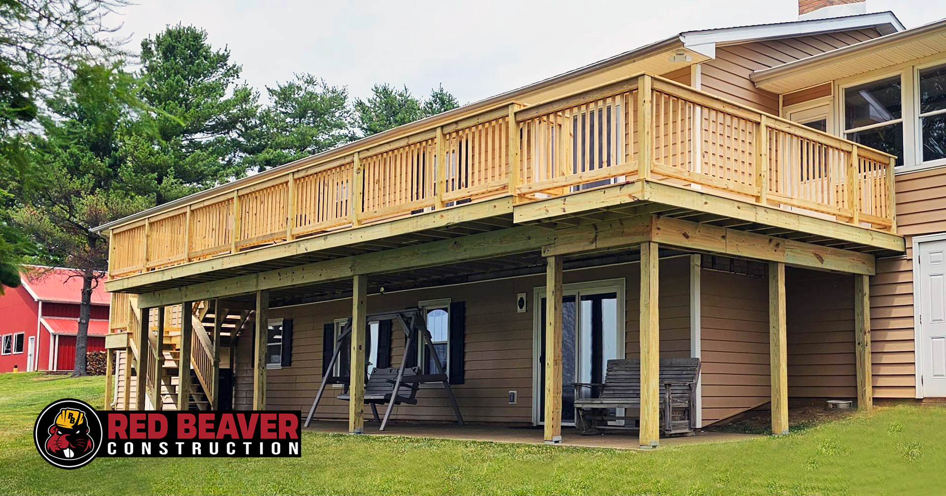 Expert fence and deck specialist consulting with homeowner over project plans in backyard setting