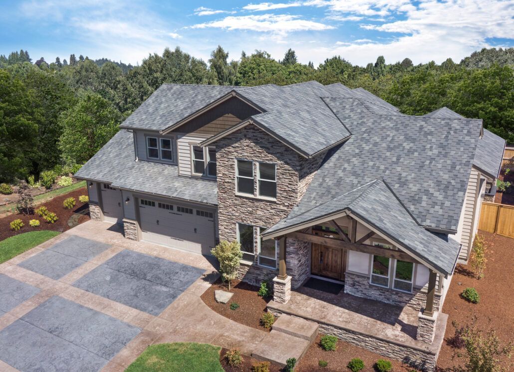 Red Beaver Construction team installing a new roof on a residential property.