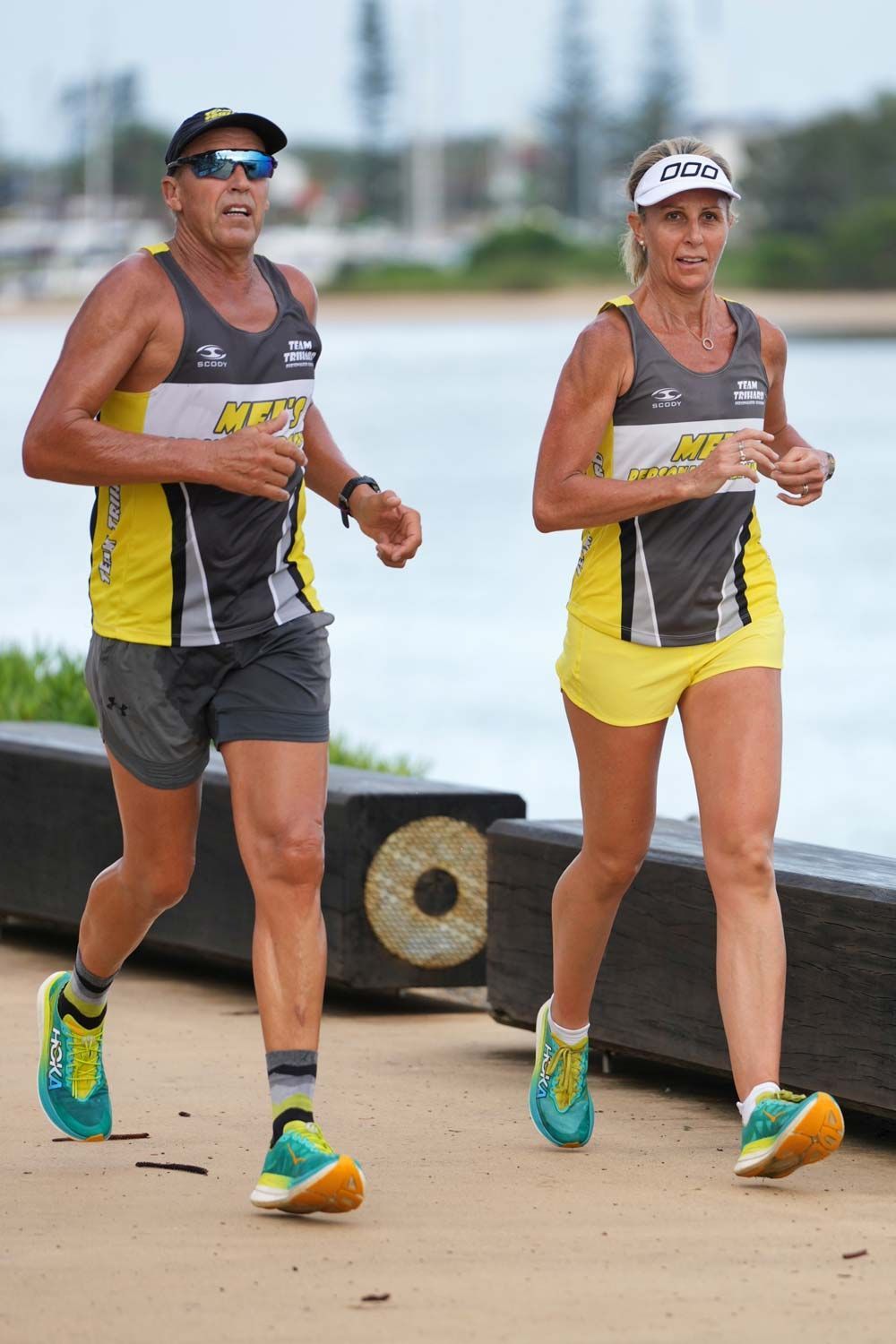 A Man And A Woman Are Running On The Beach — Run Fest in Port Macquarie, NSW