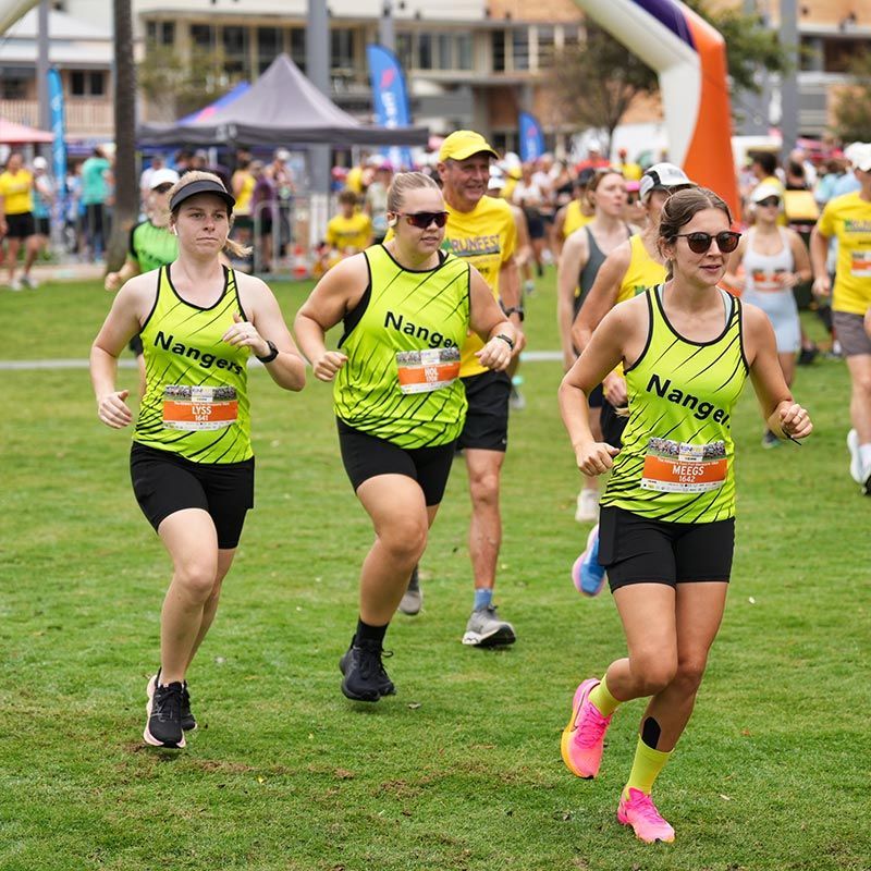 A Group Of People Are Running In A Race And One Of Them Has The Word Nanga On Her Shirt — Run Fest in Port Macquarie, NSW