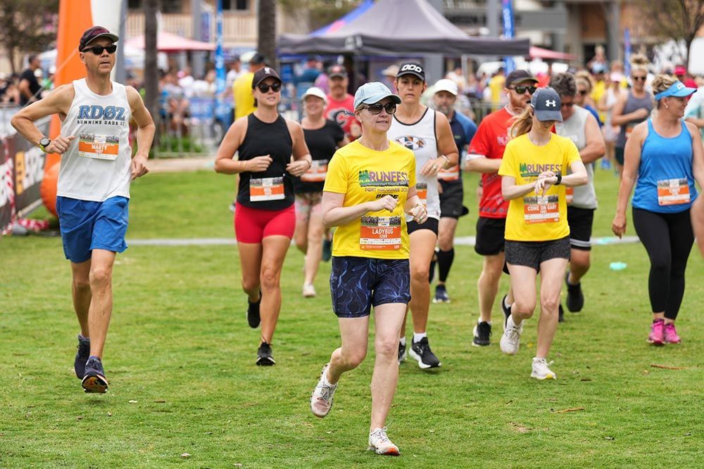 A Group Of People Are Running A Marathon In A Park — Run Fest in Port Macquarie, NSW