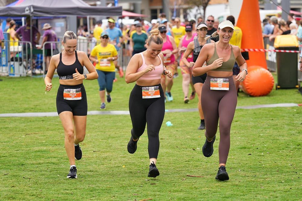 A Group Of Women Are Start Running — Run Fest in Port Macquarie, NSW