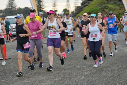A Group Of Marathon Runners Is Moving Along The Road — Run Fest in Port Macquarie, NSW