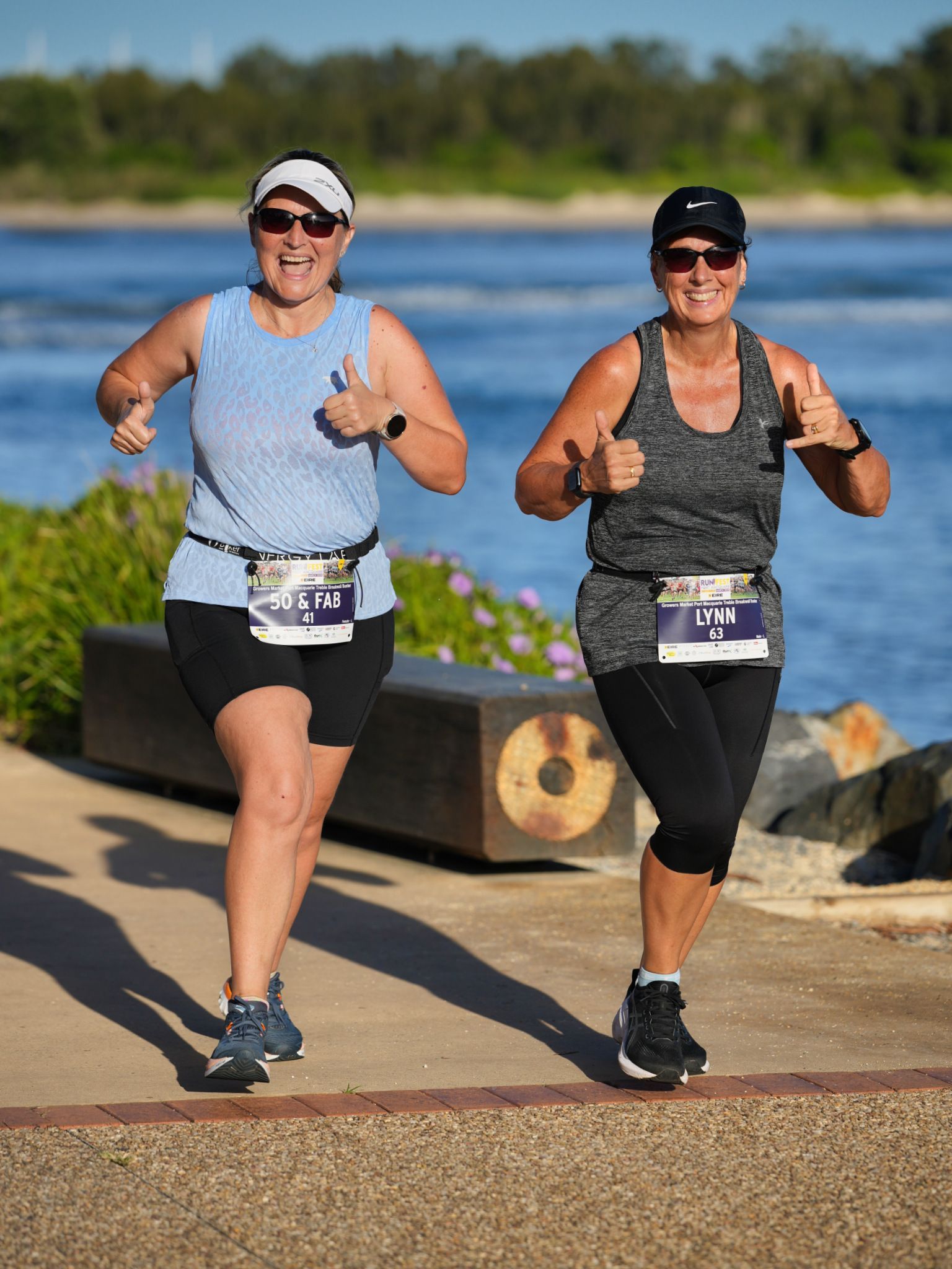 A Group Of People Wearing Run Port Mac Jersey — Run Fest in Port Macquarie, NSW