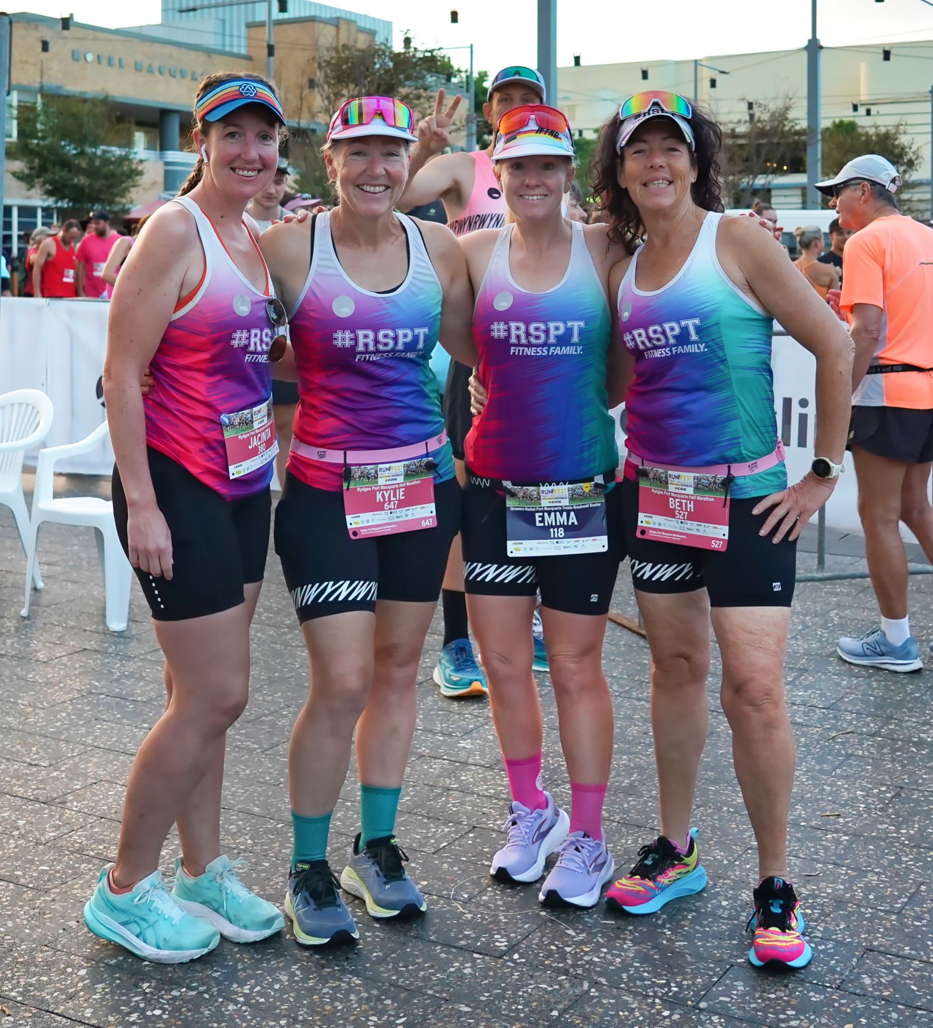 A Woman Is Running On A Path Next To A Body Of Water — Run Fest in Port Macquarie, NSW