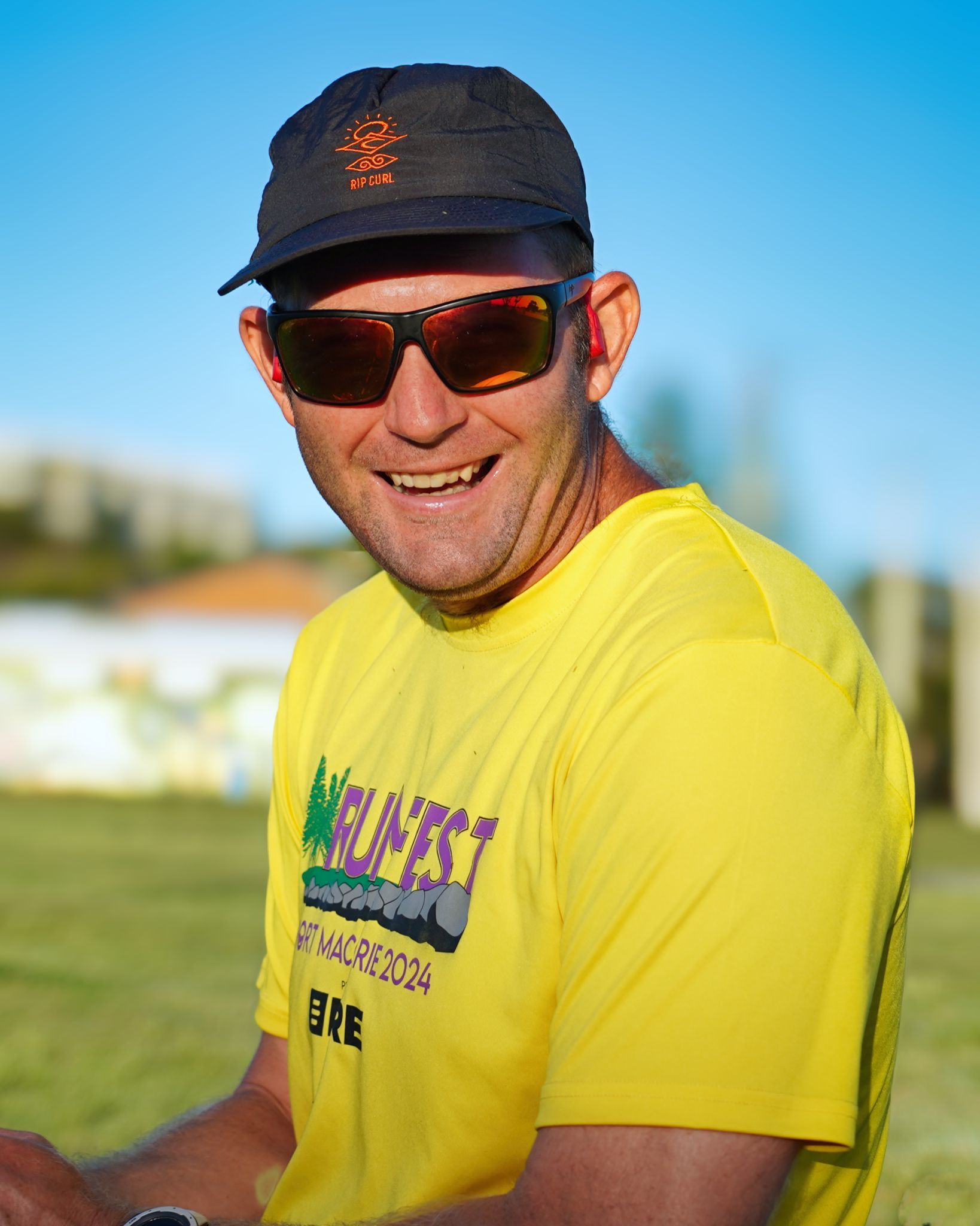 Man And Woman Wearing Yellow, Black And Blue Running Beside The Beach — Run Fest in Port Macquarie, NSW