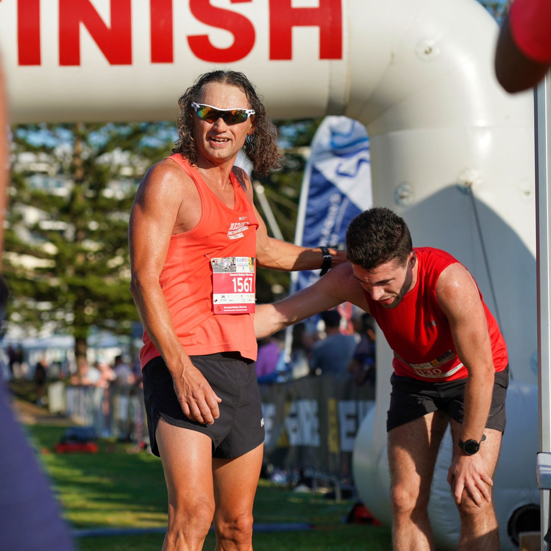 A Woman Is Running With Run Port Mac Sando — Run Fest in Central Coast, NSW