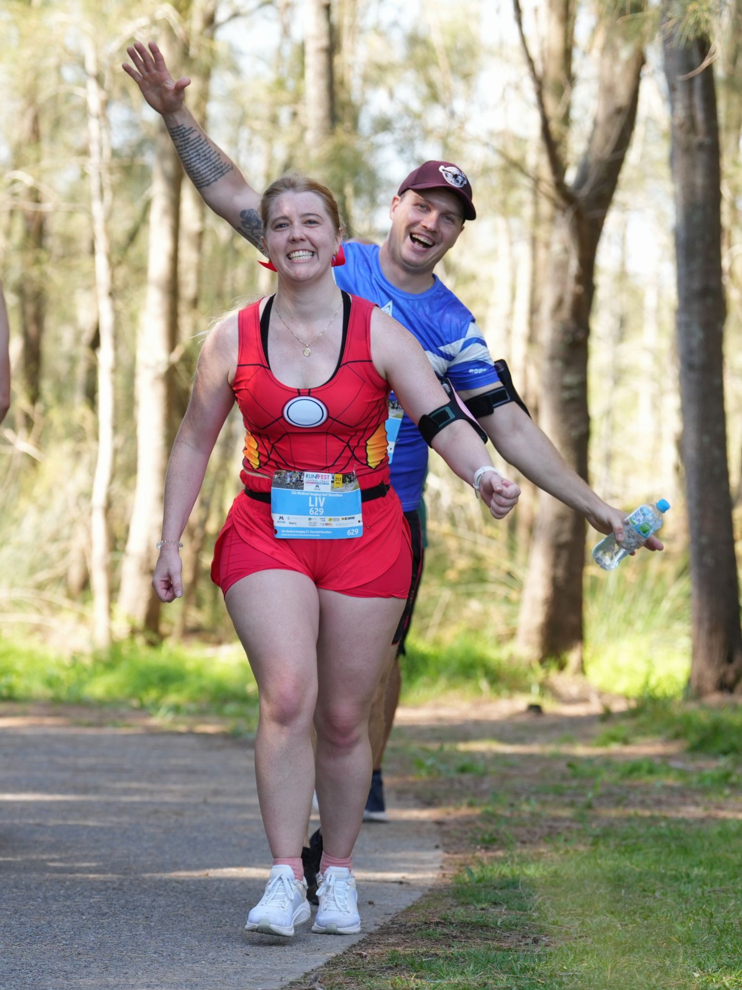 Two Women Wearing Eire Shirt Finisher — Run Fest in Central Coast, NSW