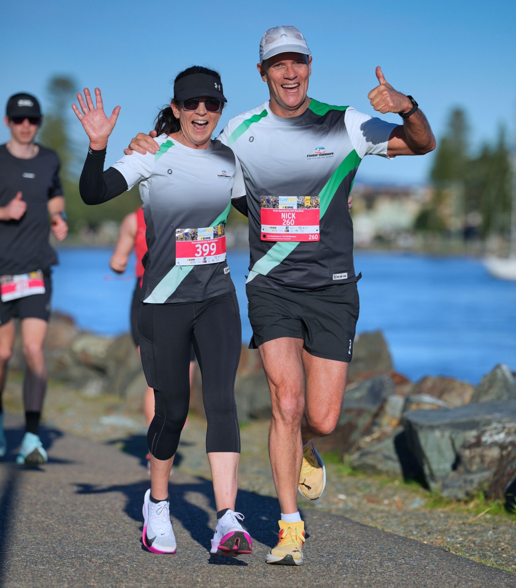 A Group Of People Are Standing Around A Table Under A Tent Registration — Run Fest in Forster - Tuncurry, NSW