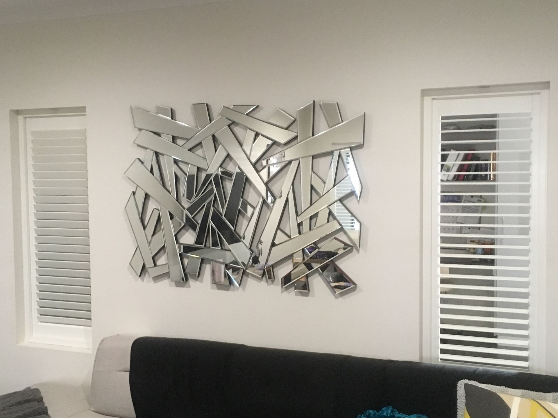 Wooden Shutters Open to a Blurred View of Green Foliage — NT Blinds in Yarrawonga, NT