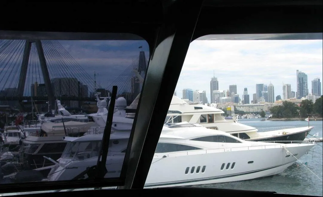 Luxury Yachts in a Marina With a City Skyline in the Background — NT Blinds in Yarrawonga, NT