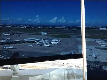 Airplanes Parked on an Airport Tarmac Under a Blue Sky — NT Blinds in Yarrawonga, NT