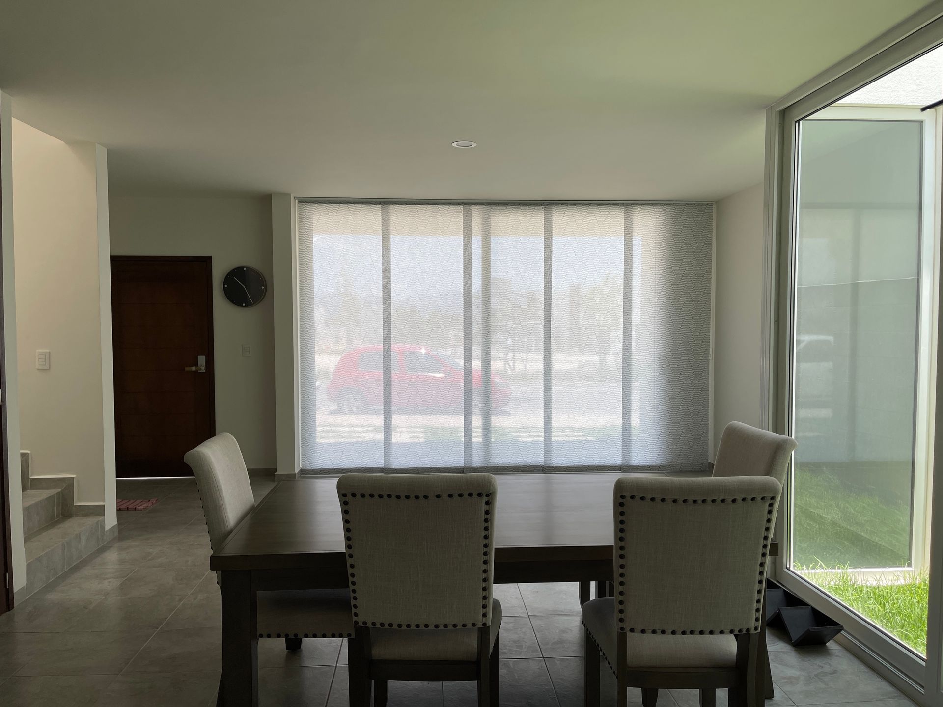 Dining Room With a Table and Panel Glide Blinds — NT Blinds in Yarrawonga, NT