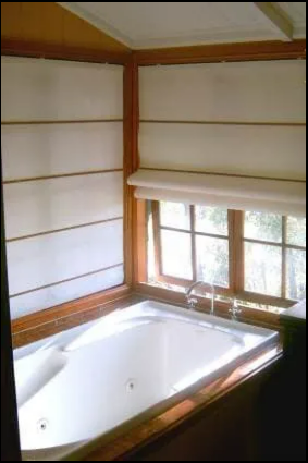 Small Bathroom With a White Soaking Tub Beneath — NT Blinds in Yarrawonga, NT