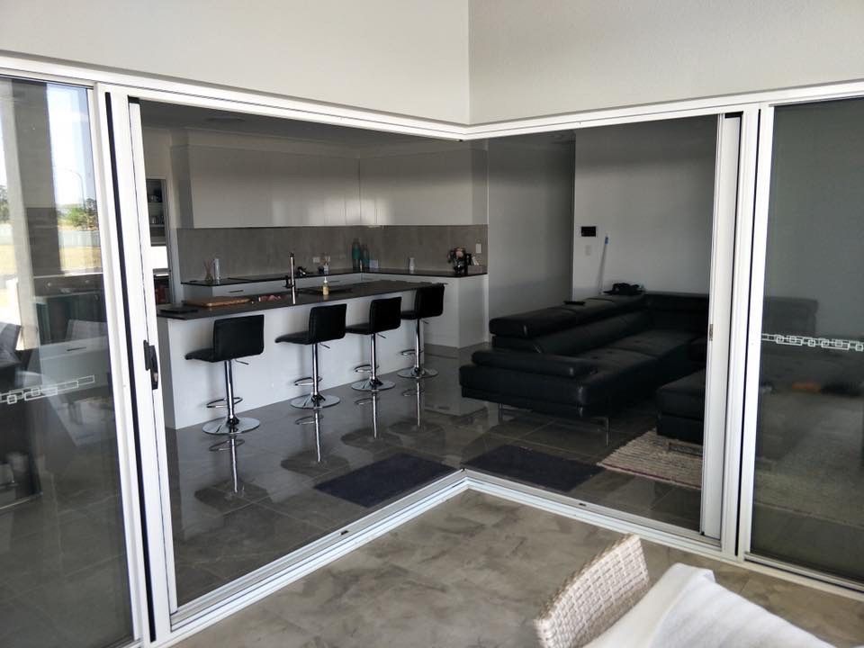 Modern Office With Desk, Chair, and Large Windows With Grey Blinds — NT Blinds in Yarrawonga, NT