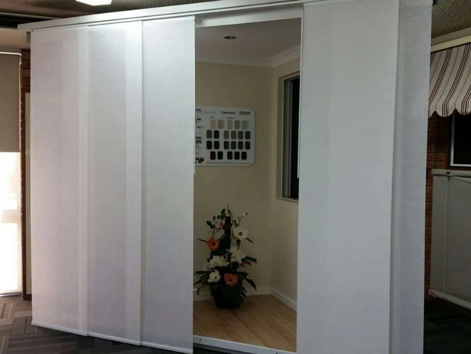 Sliding White Closet Doors Open — NT Blinds in Yarrawonga, NT