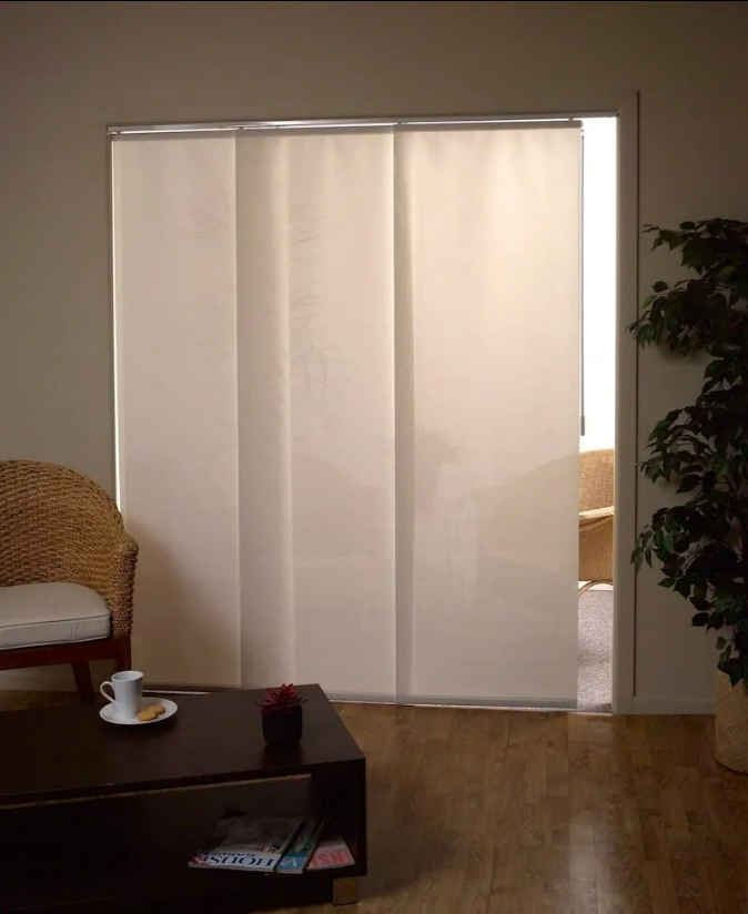 Living Room With Closed White Curtains Over a Doorway — NT Blinds in Yarrawonga, NT