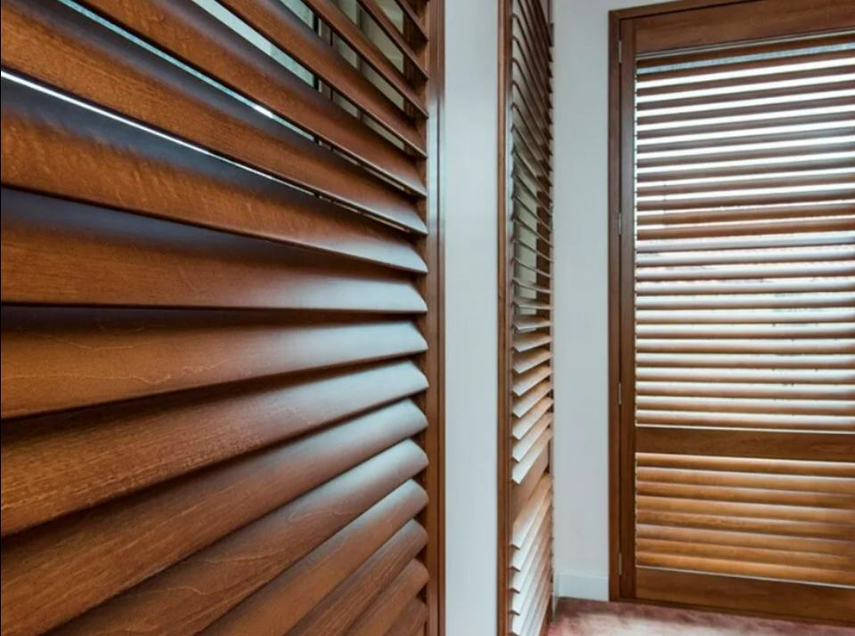 Wooden Blinds on Windows in a Bright Hallway or Room — NT Blinds in Yarrawonga, NT