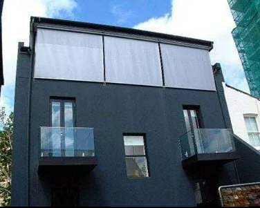 Modern Black Three-story House With Glass Balconies — NT Blinds in Yarrawonga, NT