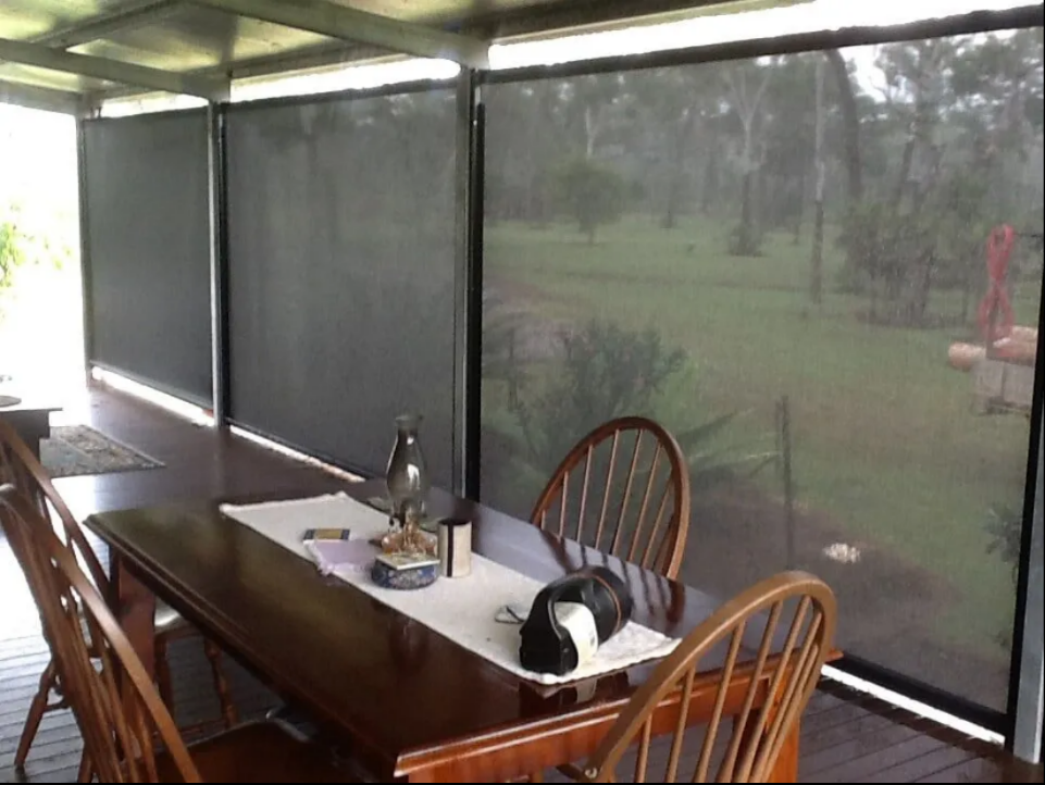 Patio With Wooden Table — NT Blinds in Yarrawonga, NT