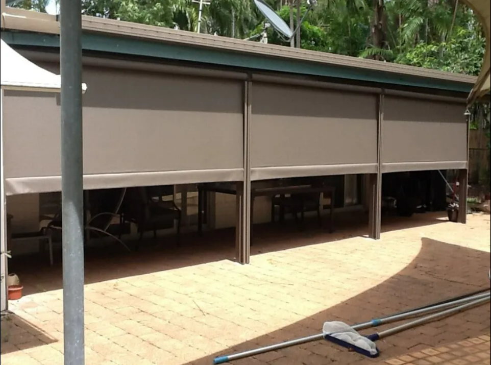 Outdoor Patio With Beige Roll-down Shades — NT Blinds in Yarrawonga, NT