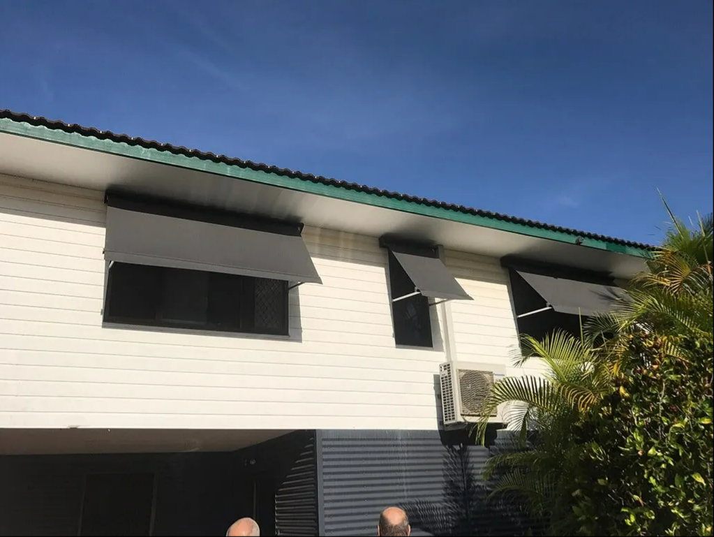 Two-story White Building With Green Roof — NT Blinds in Yarrawonga, NT