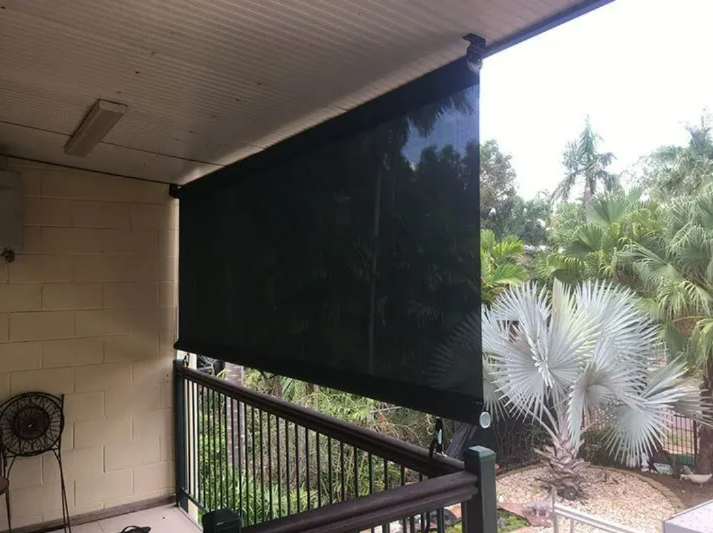 Covered Patio With a Black Roll-down Shade — NT Blinds in Yarrawonga, NT