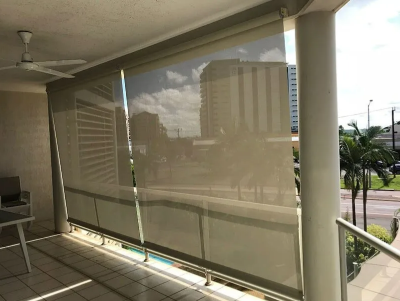 Covered Balcony With Beige Sun Shades, Reflecting a City Street — NT Blinds in Yarrawonga, NT