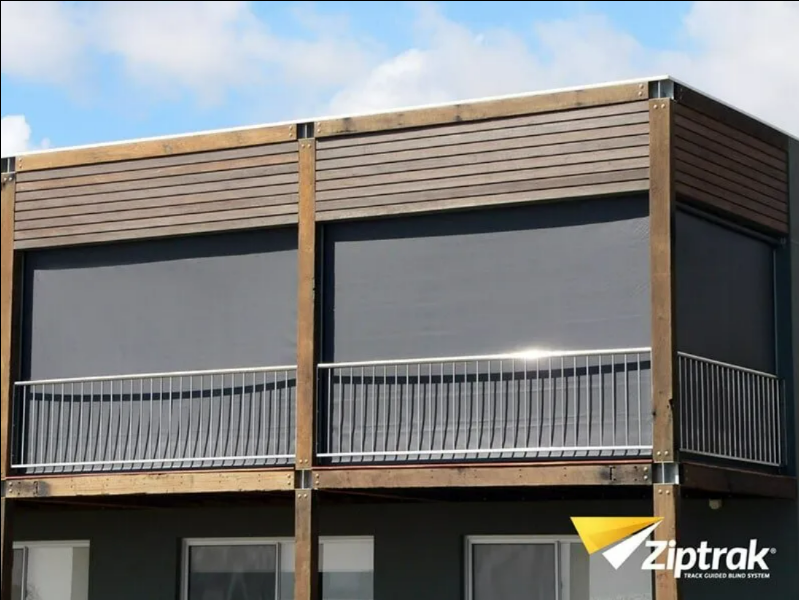 Modern Apartment Balcony With Gray Awnings — NT Blinds in Yarrawonga, NT
