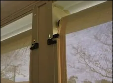 Window Blinds Mounted Beside a Beige Window Frame — NT Blinds in Yarrawonga, NT
