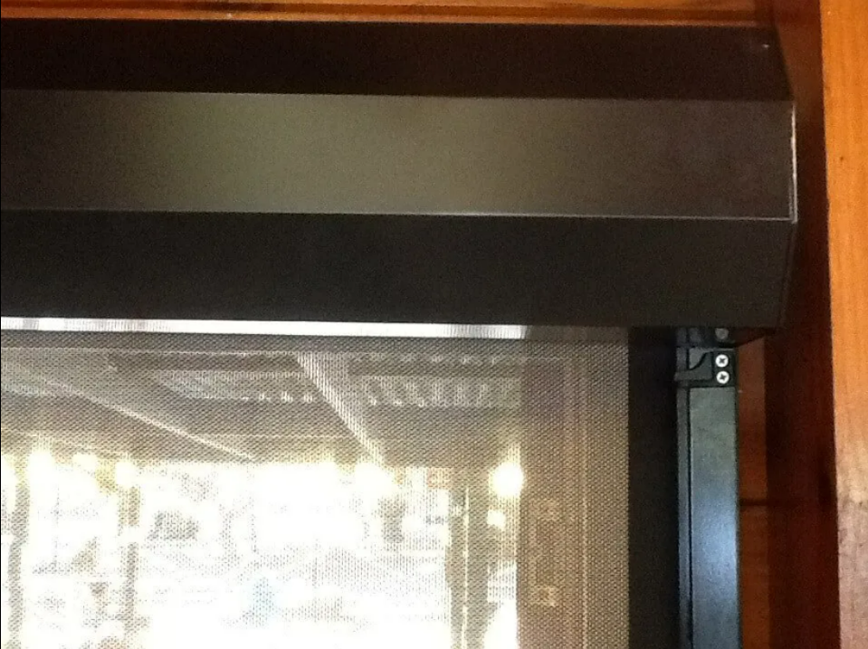 Close-up of a Black Fireplace Screen — NT Blinds in Yarrawonga, NT