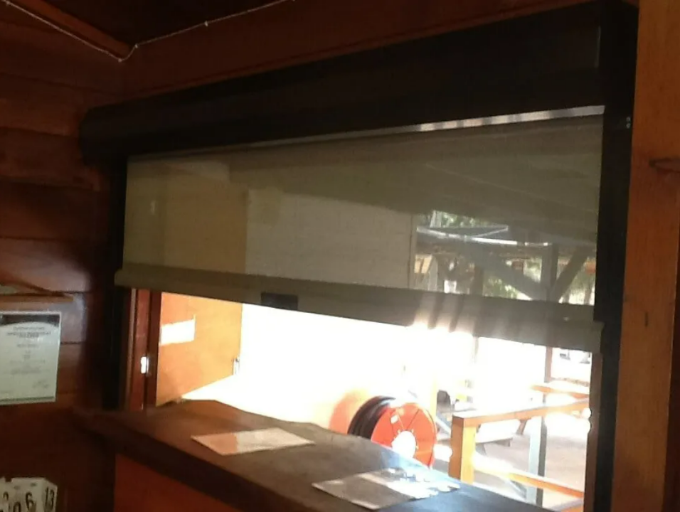 Wooden Interior With a Large Service Window Opening — NT Blinds in Yarrawonga, NT