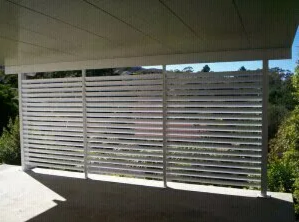 White Horizontal Slat Fence With Mountain View Beyond — NT Blinds in Yarrawonga, NT