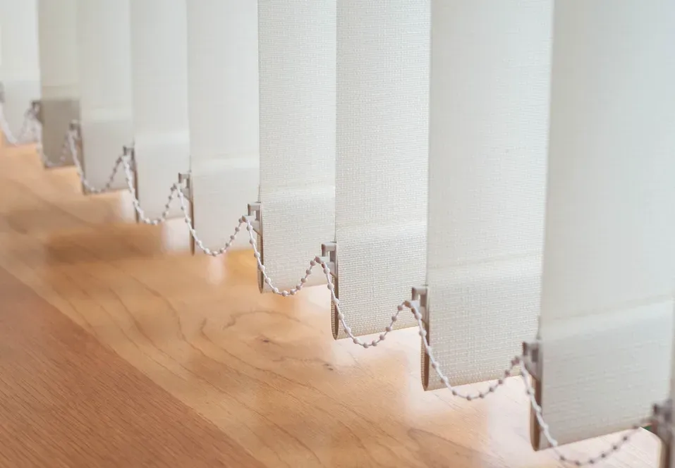 White Vertical Blinds Covering a Large Window — NT Blinds in Yarrawonga, NT