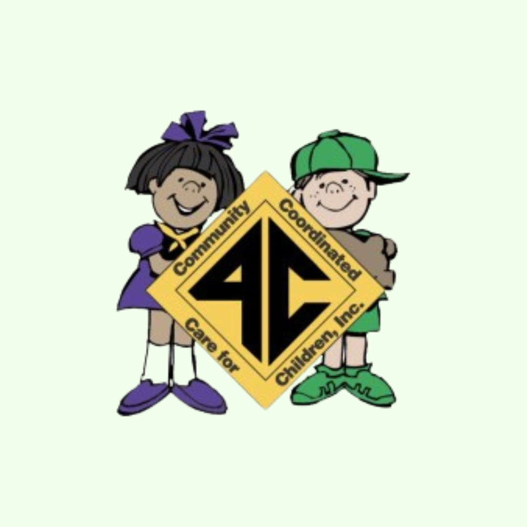 A boy and a girl are holding a sign that says community coordinated care for children inc.