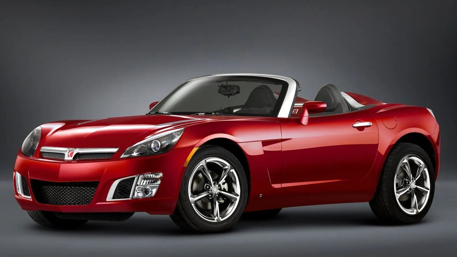 Red Saturn Sky convertible sports car.