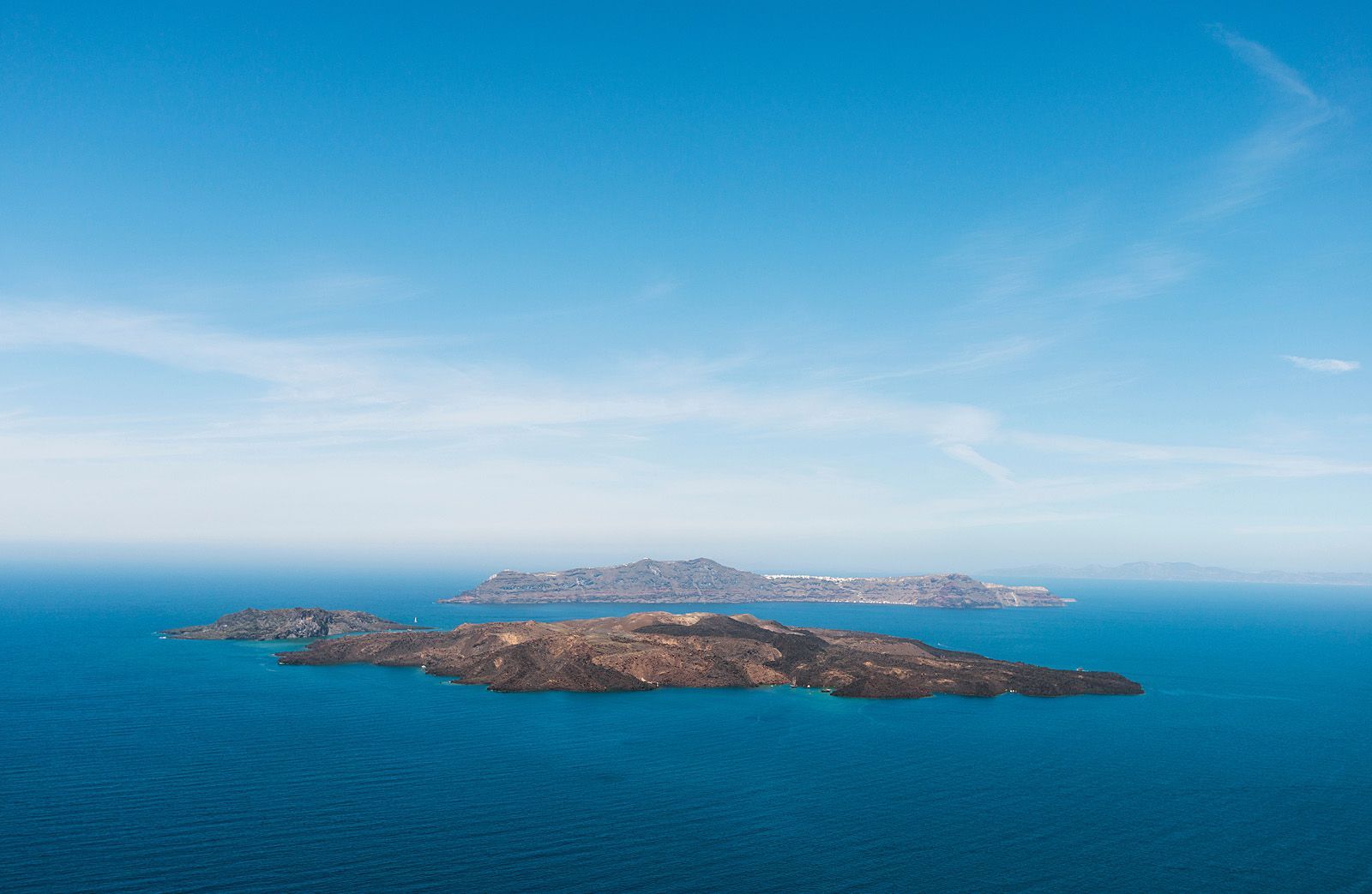 The view of the Caldera Islets as seen from Santorini Island.