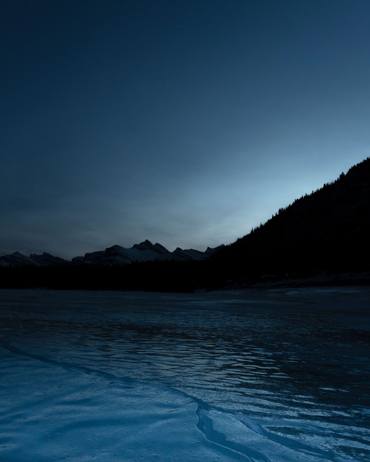 Blue hour approaches at Abraham Lake, Alberta, Canada.